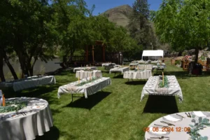 Tables decorated and setup for dinner and post wedding ceremony celebration.